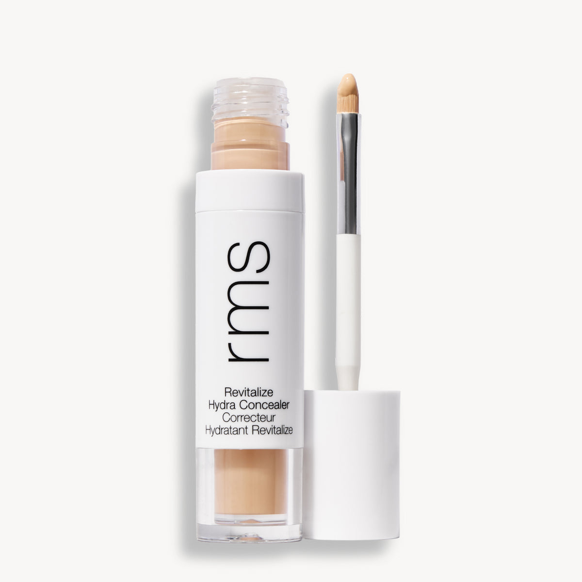 Flacon et applicateur du RMS Beauty Revitalize Hydra Concealer, Teinte N01. Anti-cernes liquide revitalisant pour une couvrance moyenne naturelle et lumineuse.