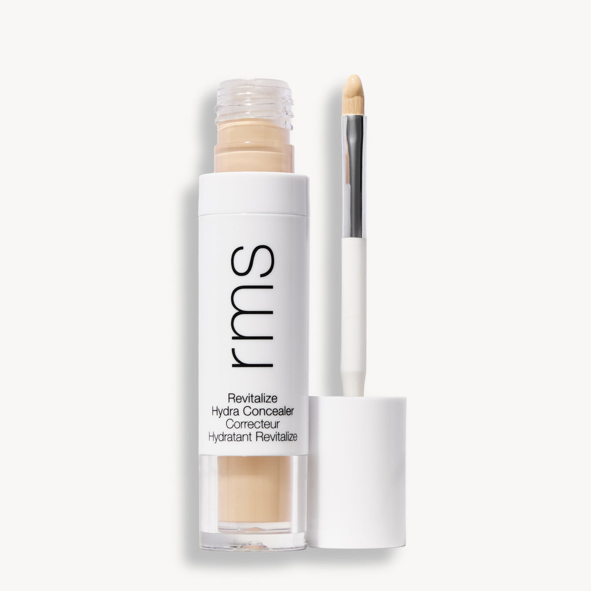 Flacon et applicateur du RMS Beauty Revitalize Hydra Concealer, Teinte WN04. Anti-cernes liquide revitalisant pour une couvrance moyenne naturelle et lumineuse.