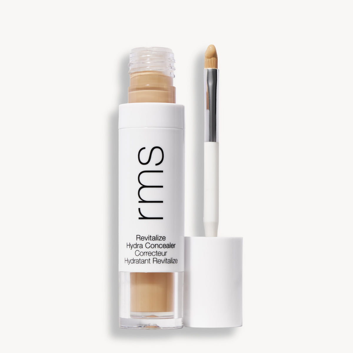 Flacon et applicateur du RMS Beauty Revitalize Hydra Concealer, Teinte W013. Anti-cernes liquide revitalisant pour une couvrance moyenne naturelle et lumineuse.