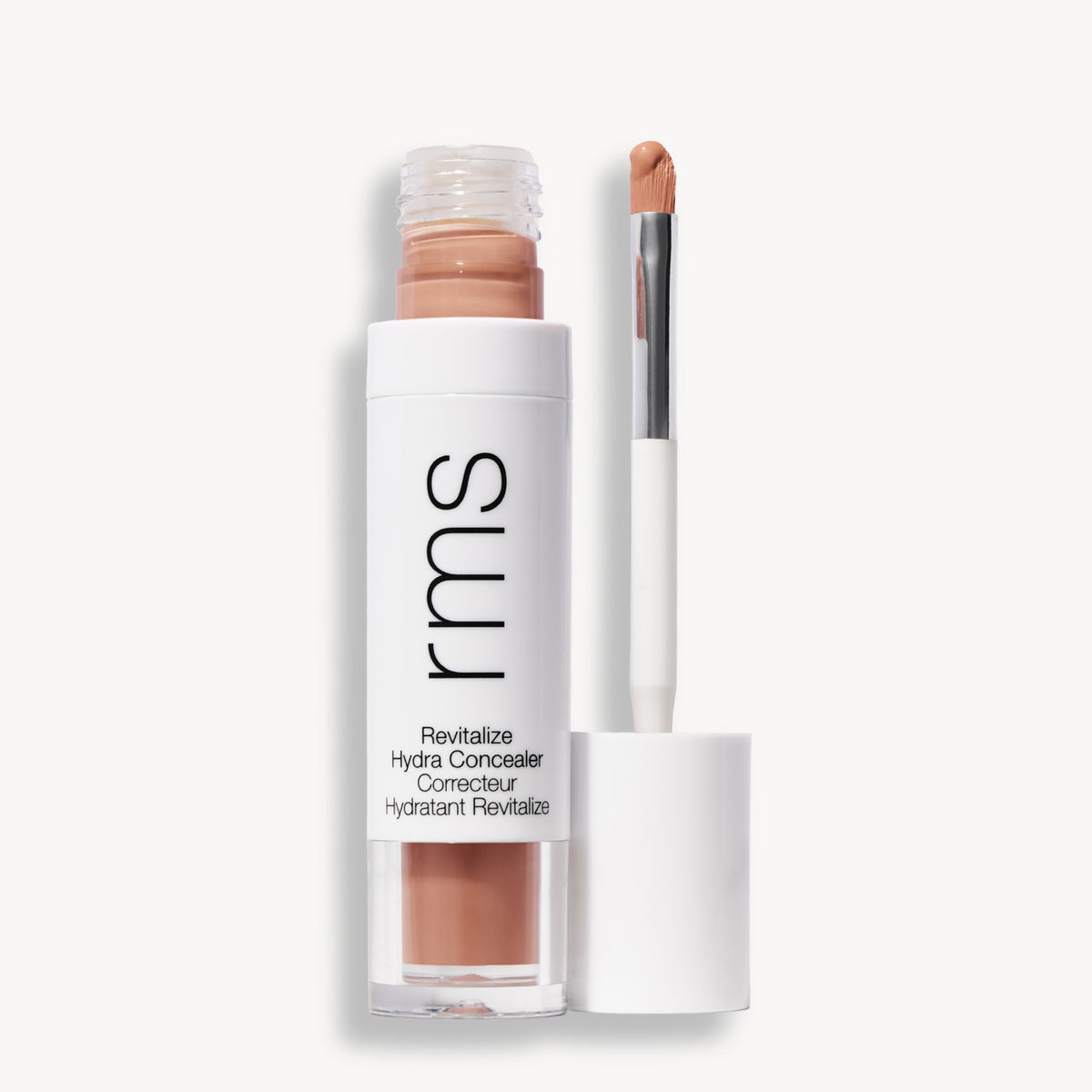 Flacon et applicateur du RMS Beauty Revitalize Hydra Concealer, Teinte C017. Anti-cernes liquide revitalisant pour une couvrance moyenne naturelle et lumineuse.