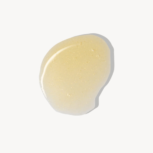 Swatch de la texture de l'huile pour le corps Attar de GRESSA SKIN. Texture riche et dorée.