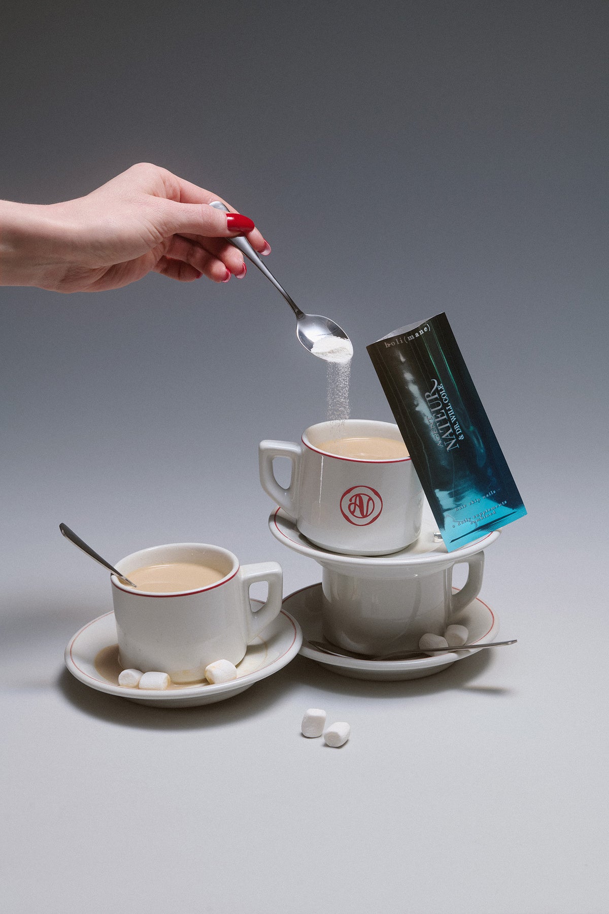 Holi (Mane) - Agent Nateur - powder being spooned into a cup