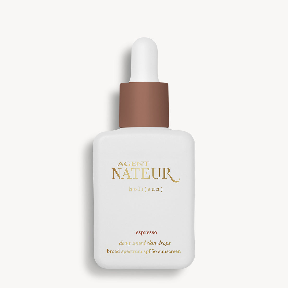 Holi (Sun) Dewy Tinted Skin Drops SPF50 - Agent Nateur - flacon teinte Espresso de face
