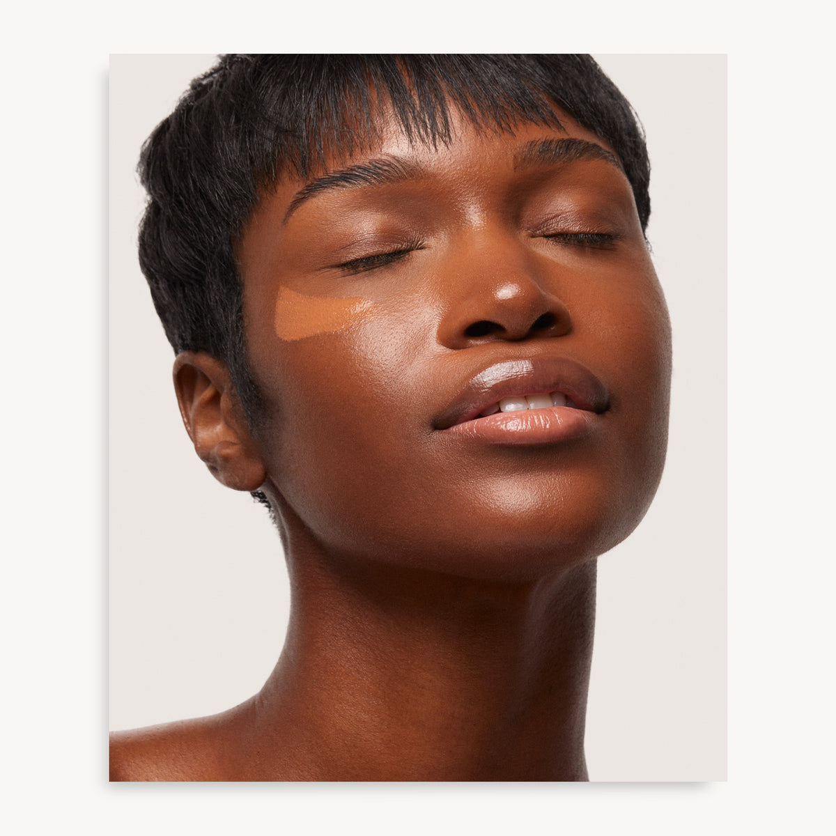 Holi (Sun) Dewy Tinted Skin Drops SPF50 - Agent Nateur - Espresso shade swatched on deep skin